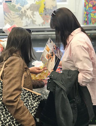 Students Examining Prints