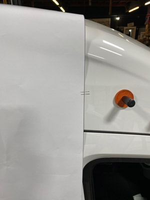 Marking graphic installation with a grease pencil